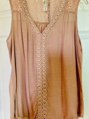 Women's sleeveless summer top with beautiful detail. Tan size medium.